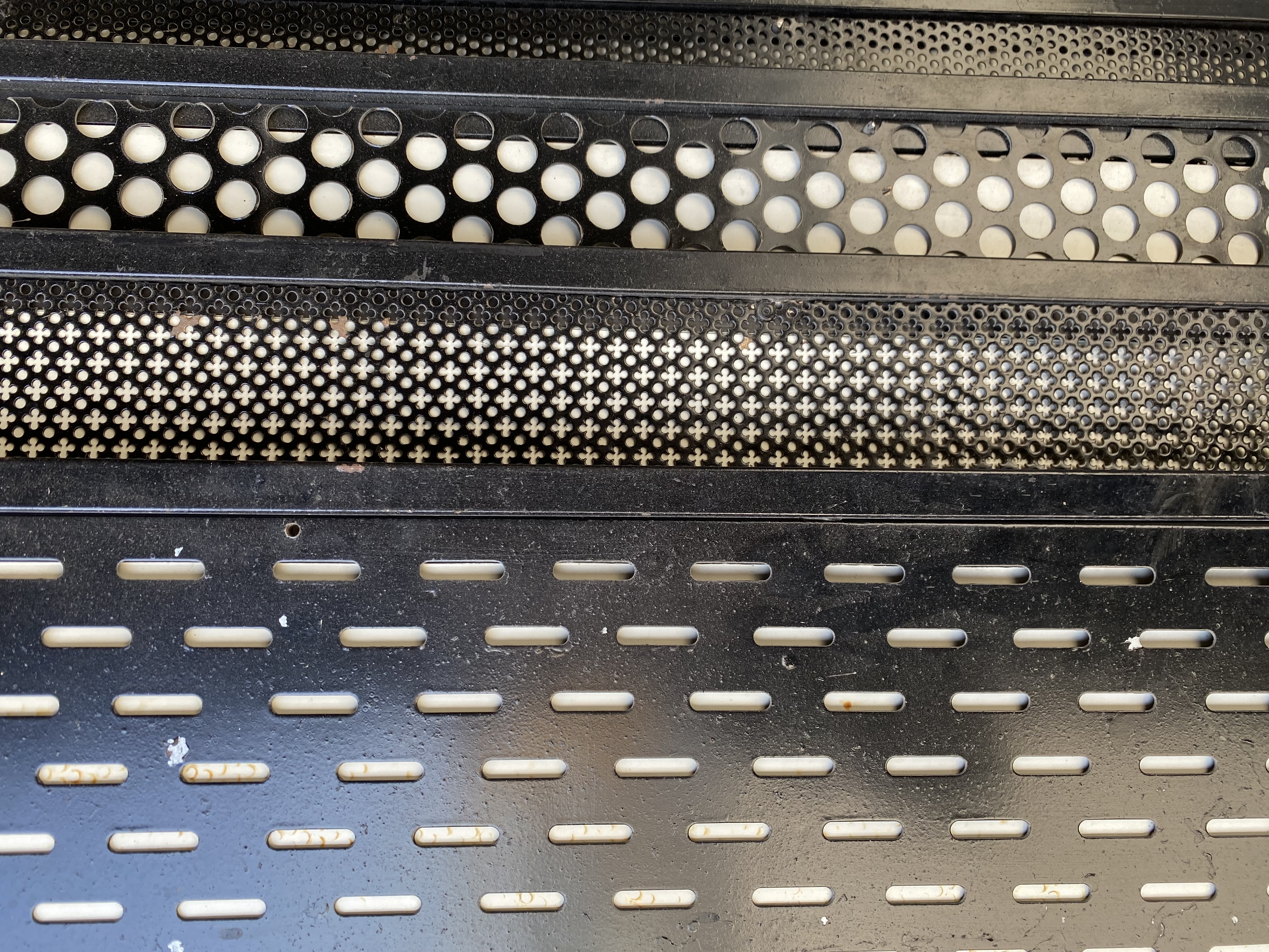 Perforated steel sheets and coils