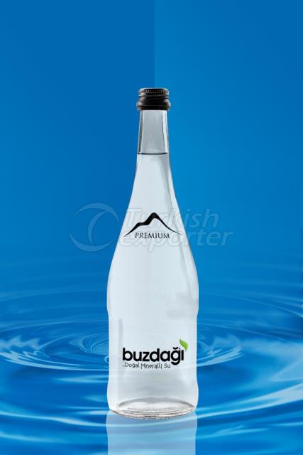 Agua de botella de vidrio