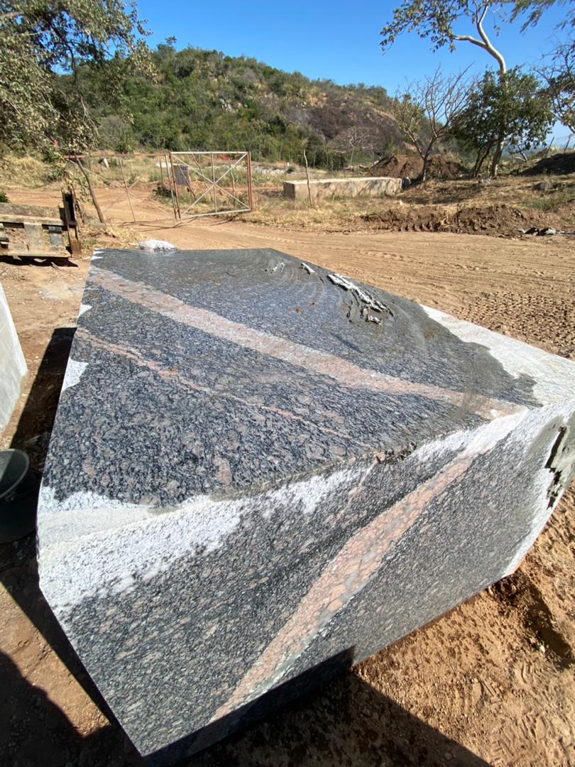 Rose black granite block