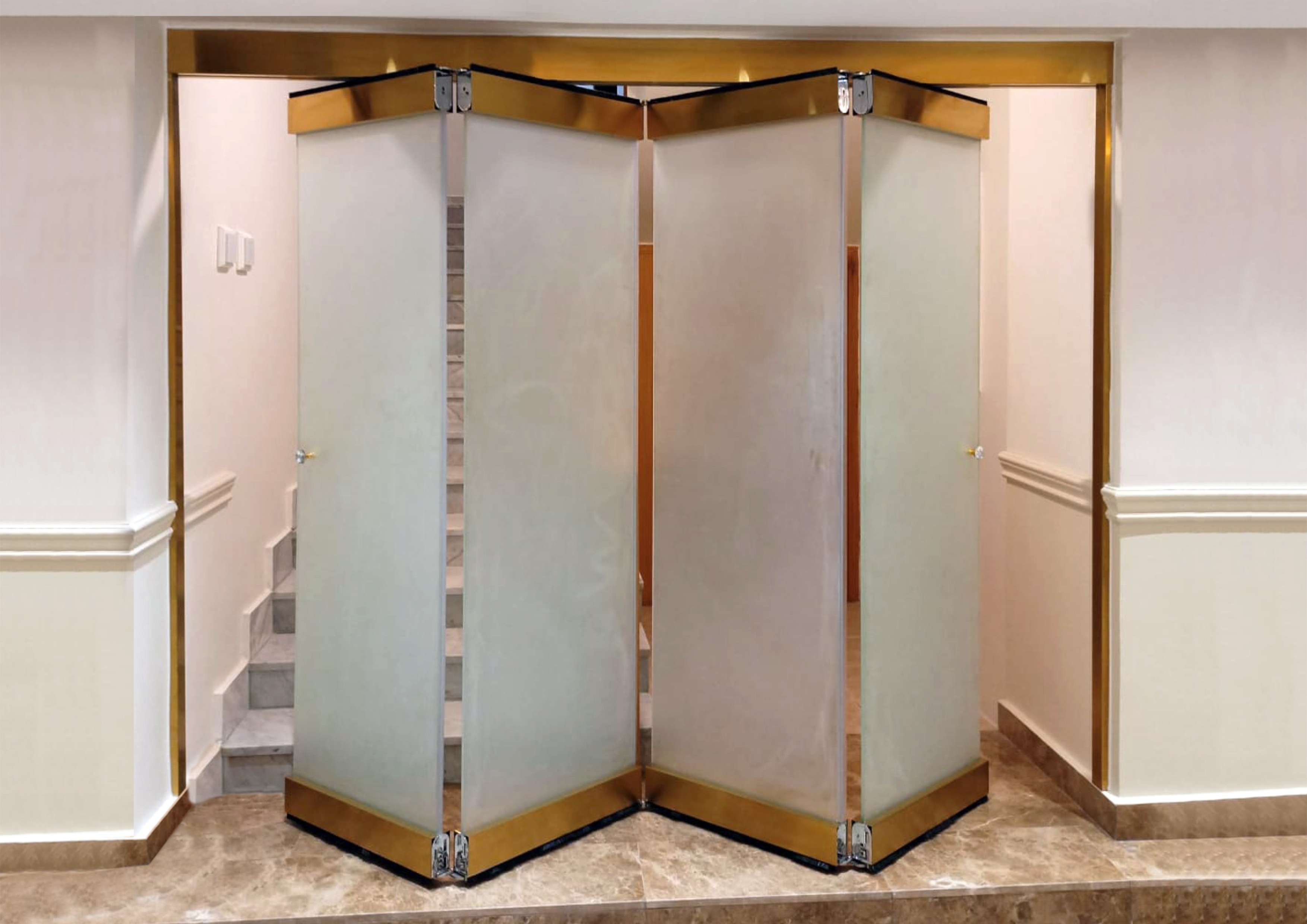 ACCORDION FOLDING GLASS DOOR SYSTEM