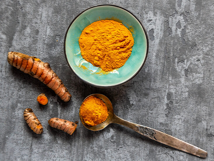 Turmeric Powder and Finger 