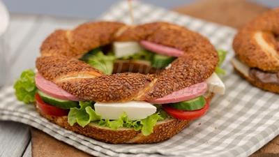 White Cheese and Salami Between Bagel